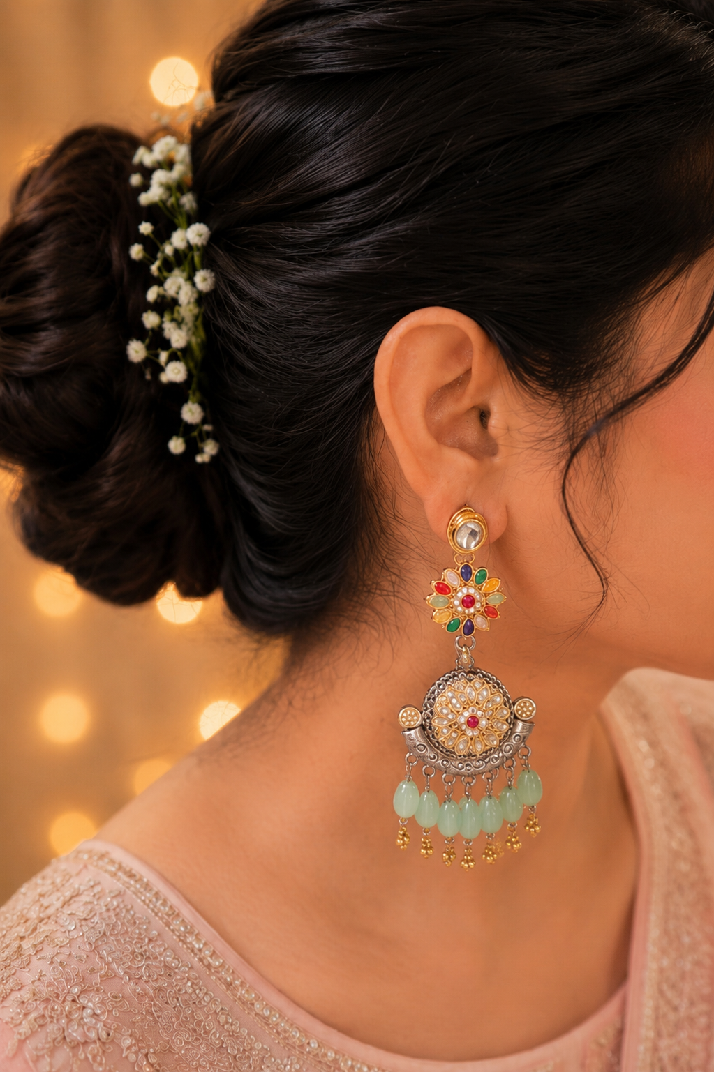 Phooljhadi Chaandbalis :  Bursting with vibrant floral artistry and elegant chaandbali charm, the Phooljhadi Chaandbalis bring festive sparkle to every look.  - back view