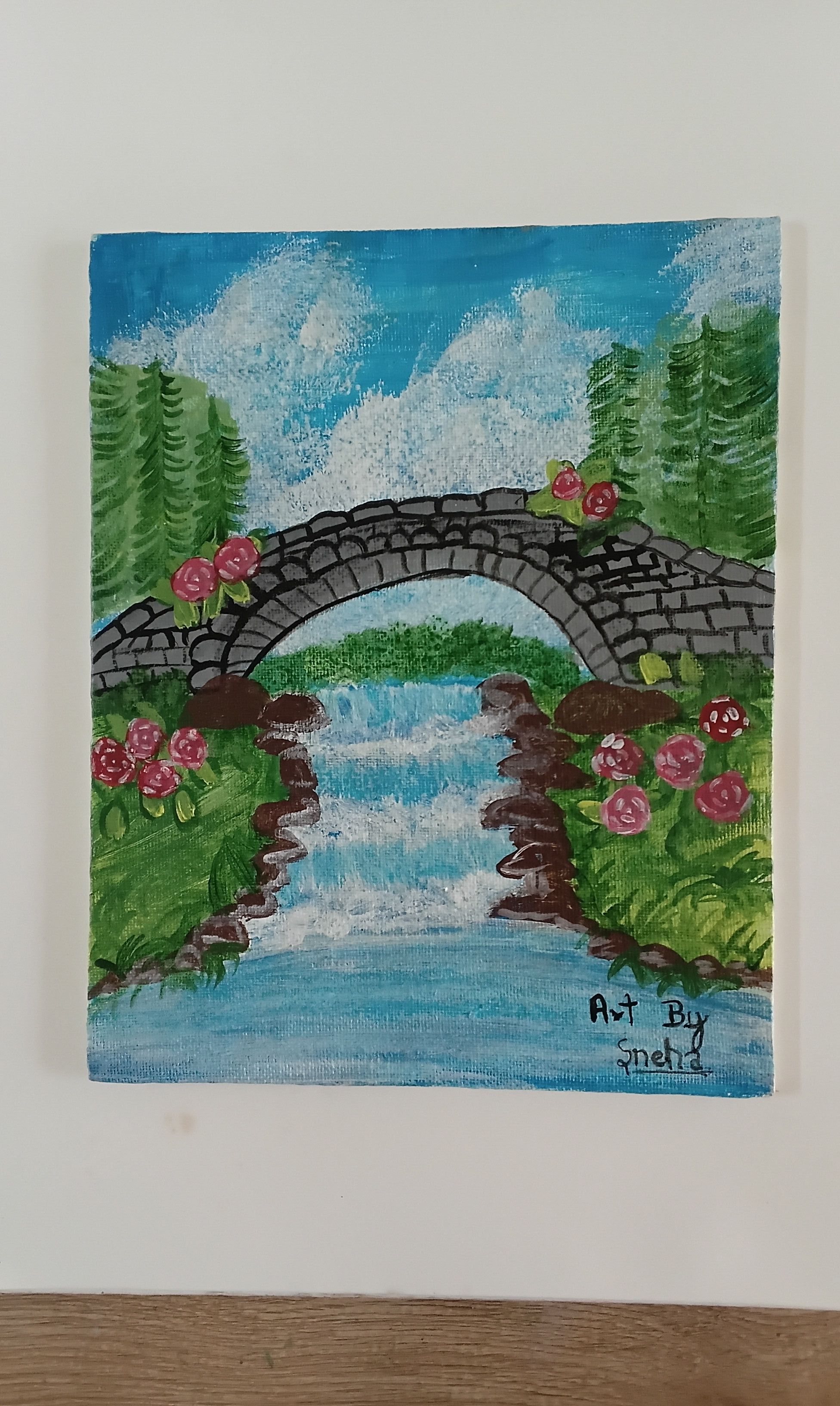 Waterfall along the bridge